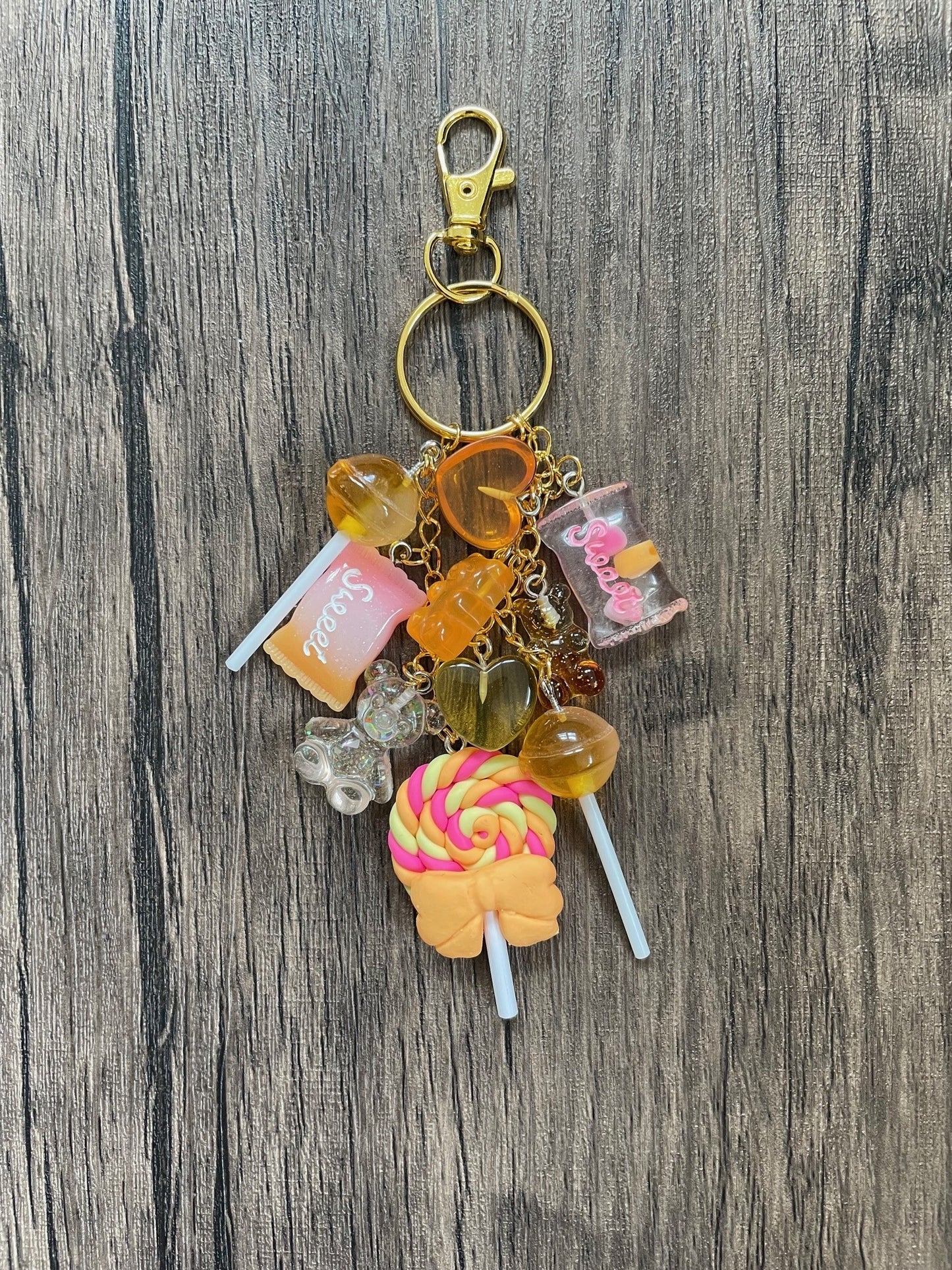 Love Candy Amber Lollipop, Hearts, and Gummy Bear Gold Bag Charm