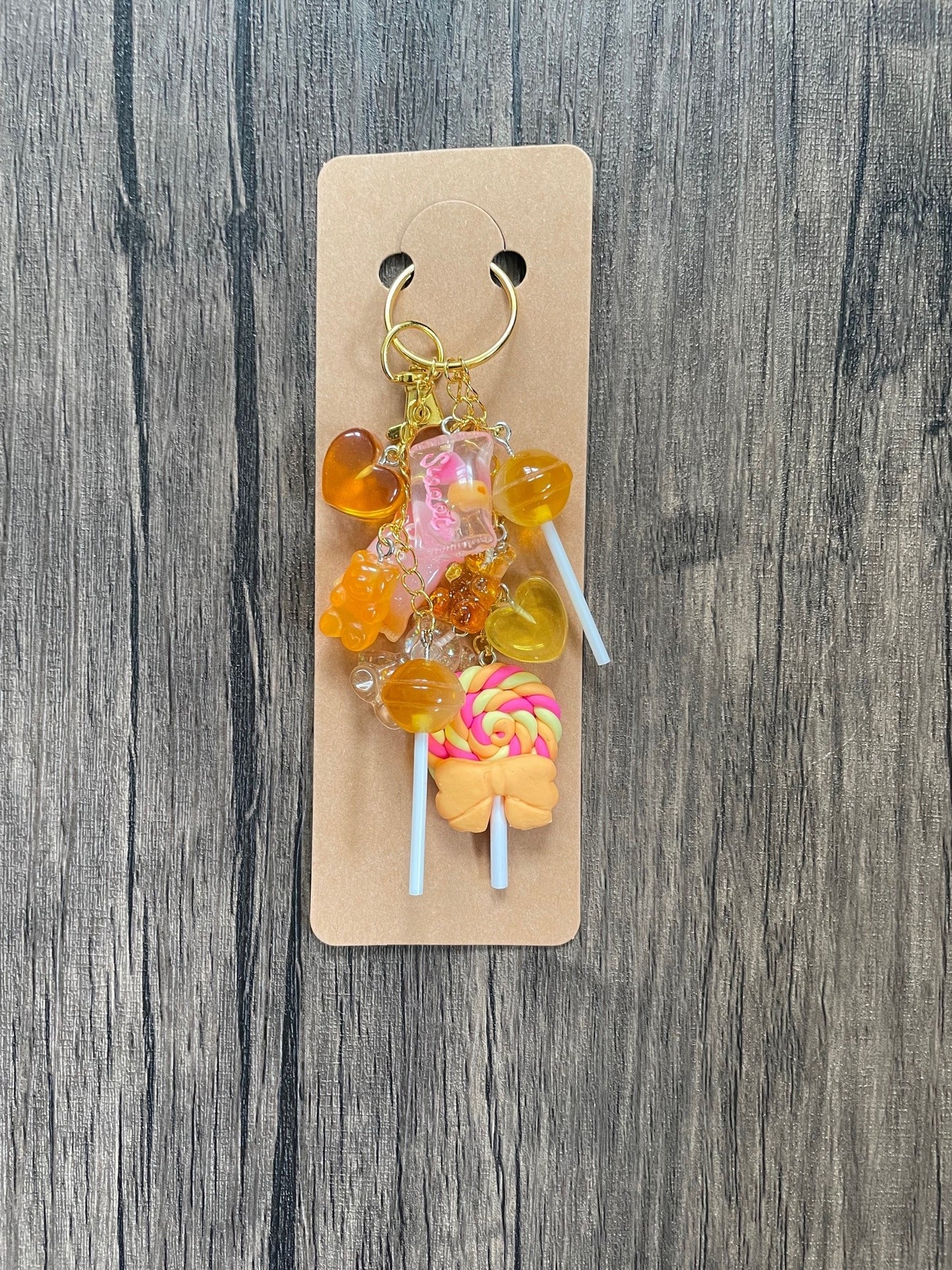 Love Candy Amber Lollipop, Hearts, and Gummy Bear Gold Bag Charm