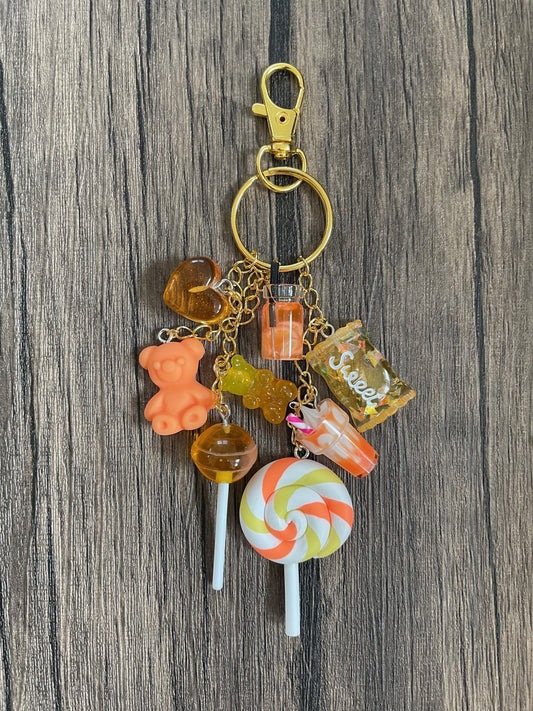 Love Candy Orange Milkshake, Gummy Bear, Lollipop, and Hearts Gold Bag Charm