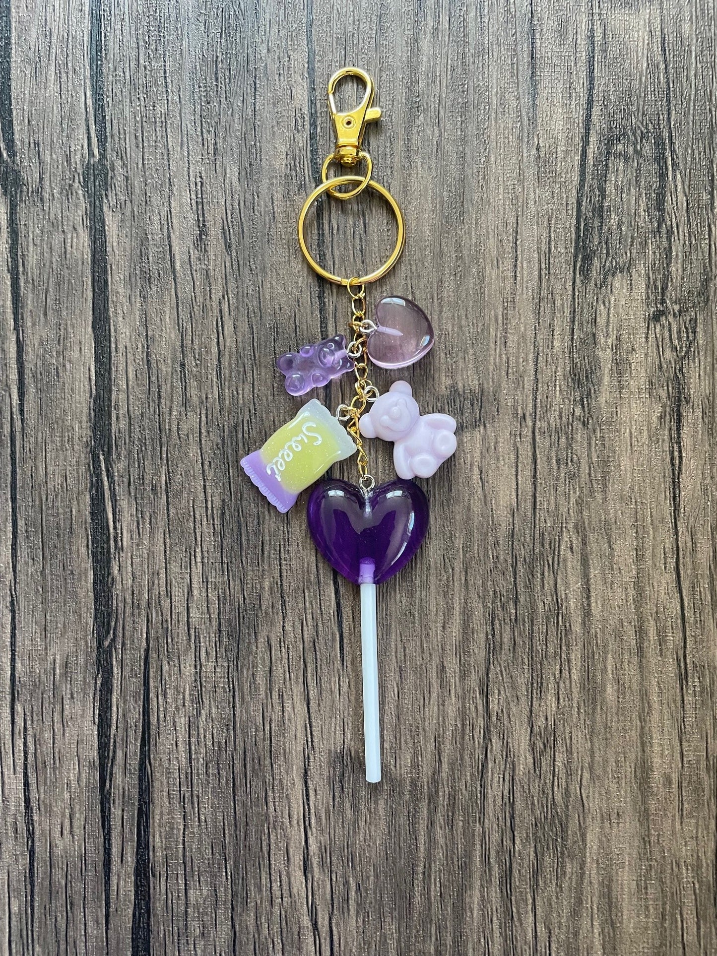 Love Candy Purple Lollipop, Heart, and Gummy Bear Gold Bag Charm
