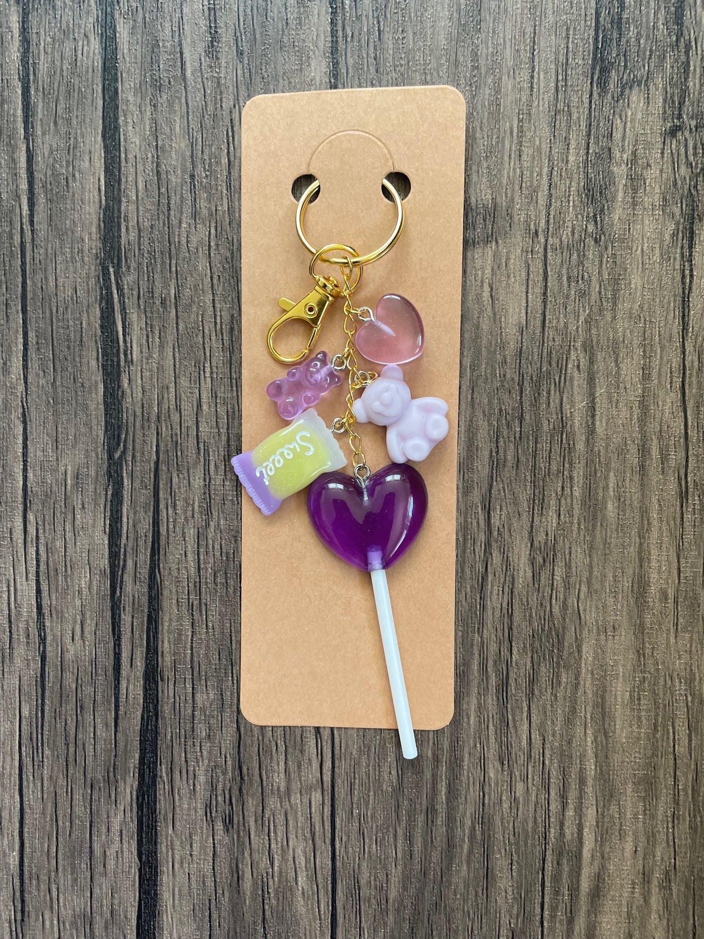 Love Candy Purple Lollipop, Heart, and Gummy Bear Gold Bag Charm