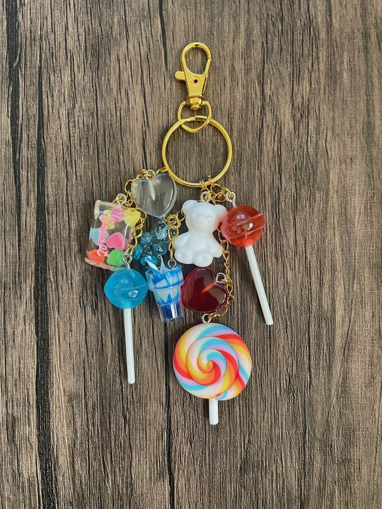 Love Candy Red and Blue Lollipop, Hearts, and Gummy Bear Gold Bag Charm